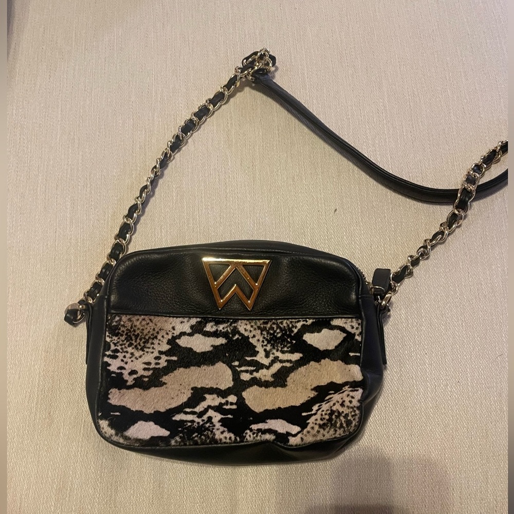 Kelly Wynne Leather and Calf-hair ‘Mingle Mingle Mini’ Purse